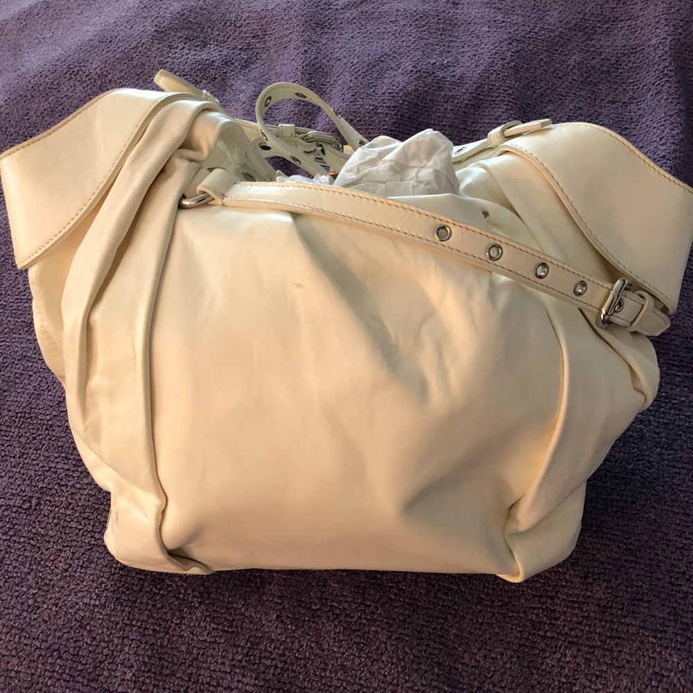 Cream Kooba leather purse.